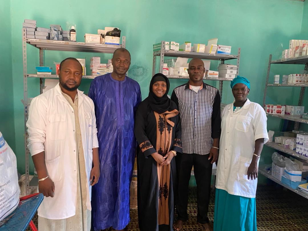 Pharmacists at a stocked pharmacy in Mali