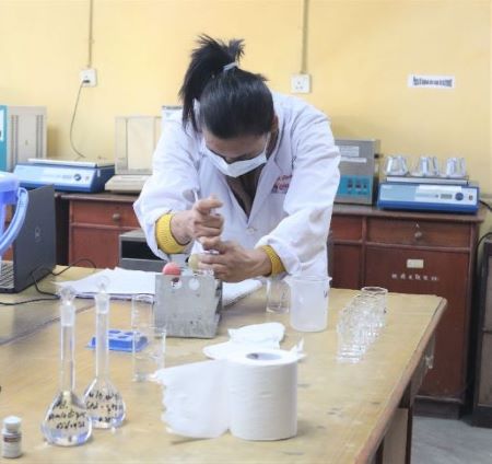 Pharmacist working in quality control lab in Nepal